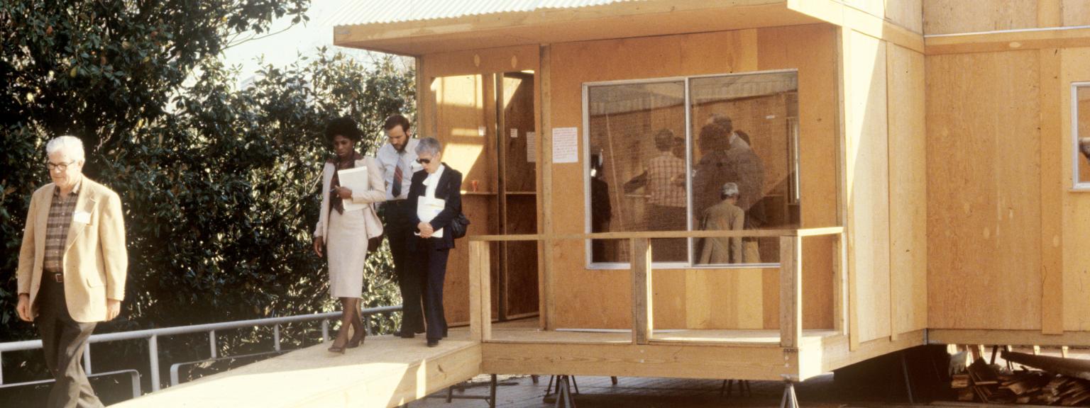 People explore a building prototype.